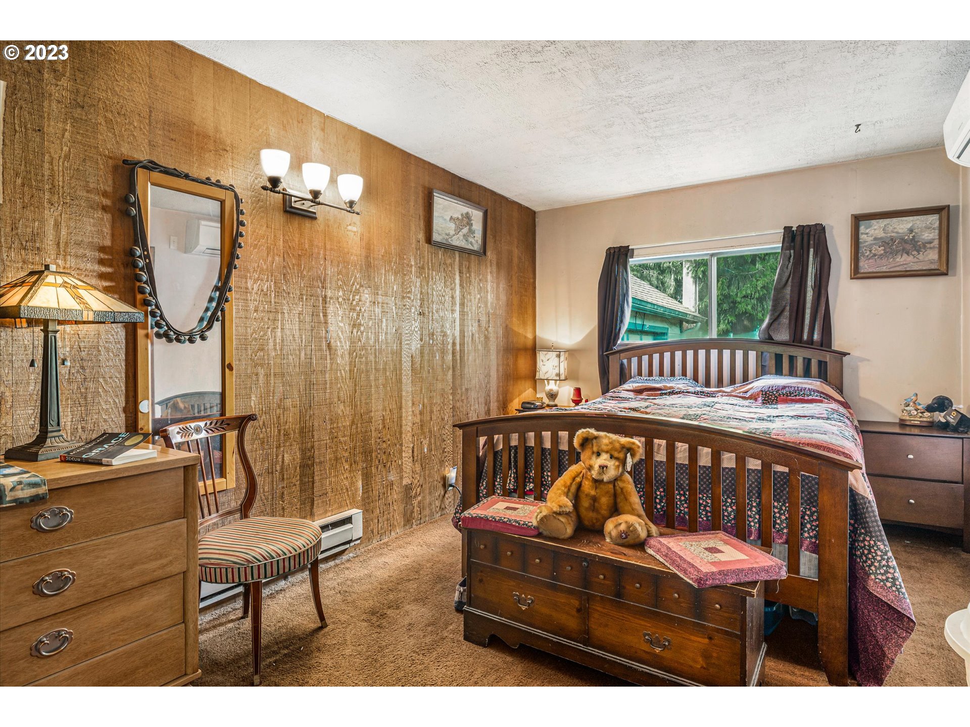 39400 Southeast Trubel Road Sandy, OR 97055 - Photo 13 of 34 a bedroom with a bed and a mirror