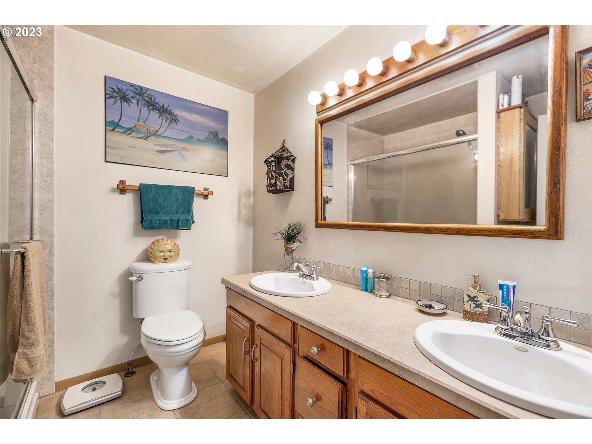 39400 Southeast Trubel Road Sandy, OR 97055 - Photo 16 of 34 a bathroom with a granite countertop toilet a sink and a mirror
