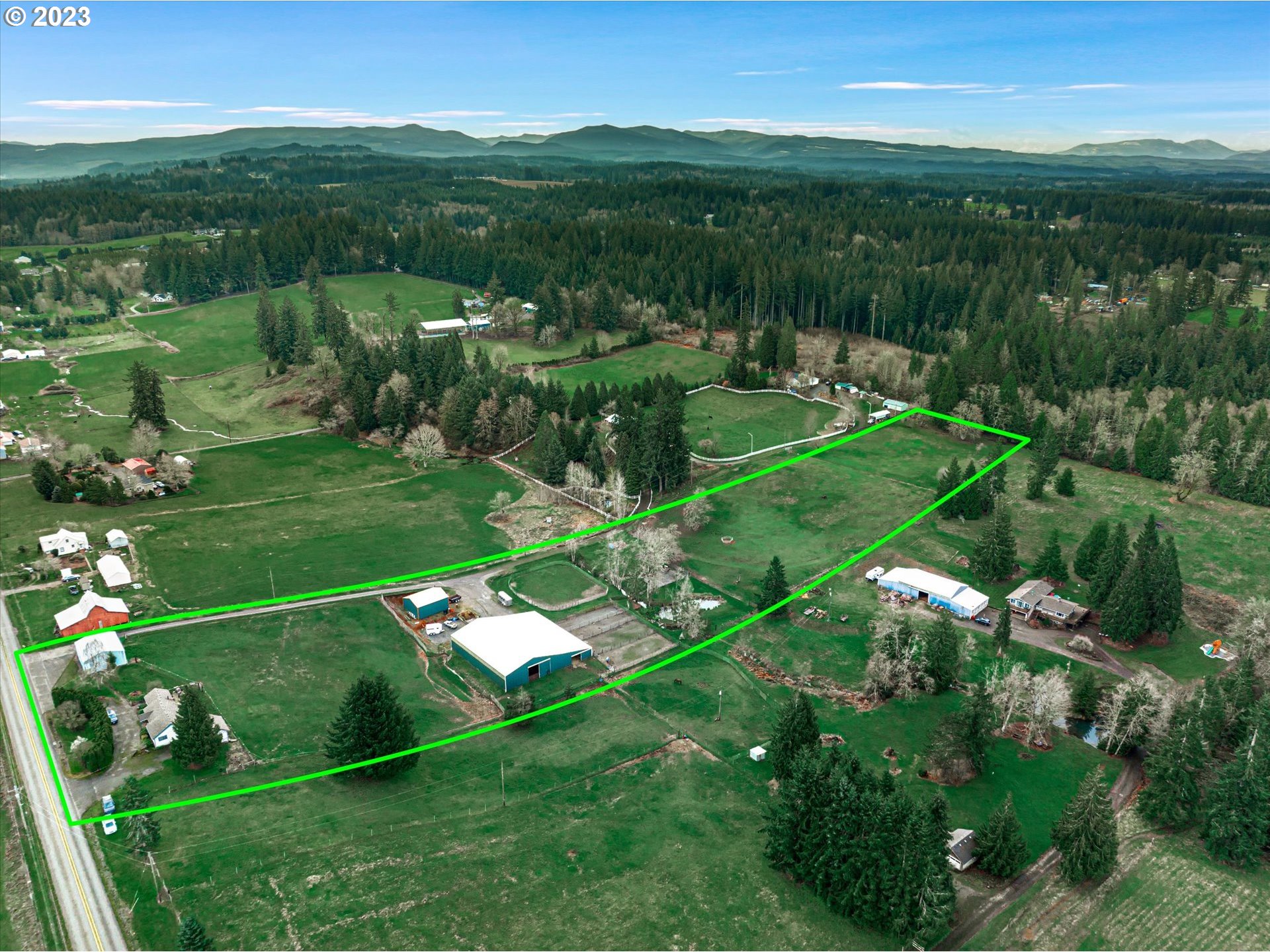 39400 Southeast Trubel Road Sandy, OR 97055 - Photo 2 of 34 a view of a lush green hillside and houses