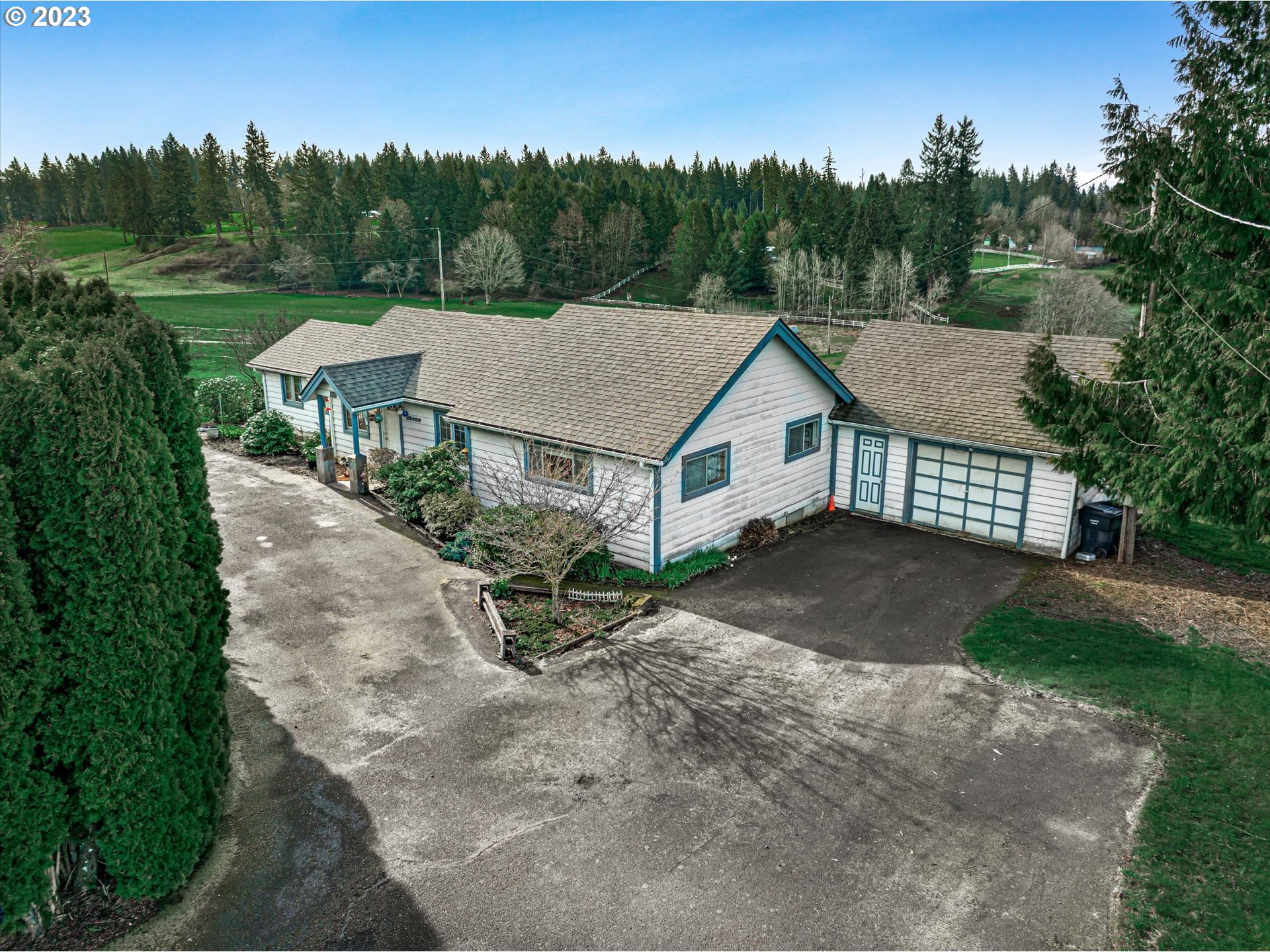 39400 Southeast Trubel Road Sandy, OR 97055 - Photo 3 of 34 a aerial view of a house with yard and green space