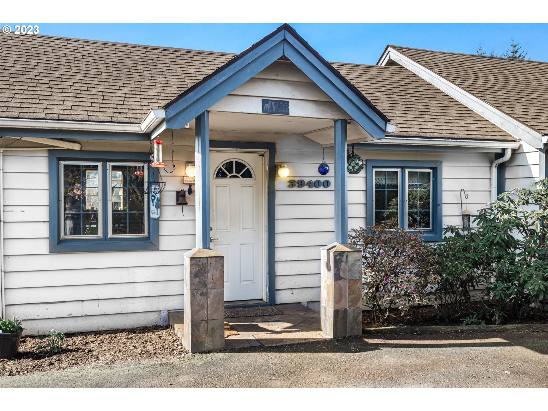 39400 Southeast Trubel Road Sandy, OR 97055 - Photo 6 of 34 a front view of a house with a yard