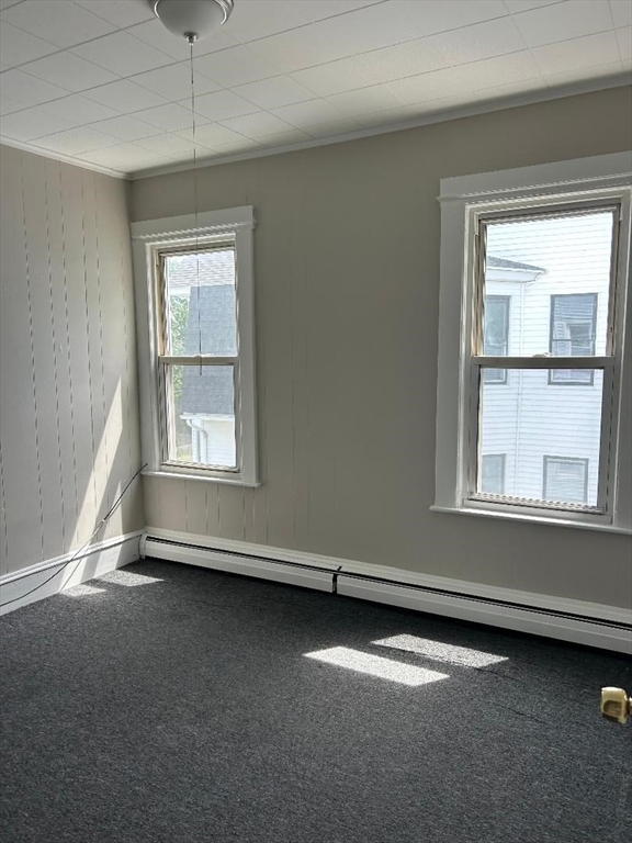 80 Cochran Street, Unit 3L Chicopee, MA 01020 - Photo 6 of 8 an empty room with a empty space and windows
