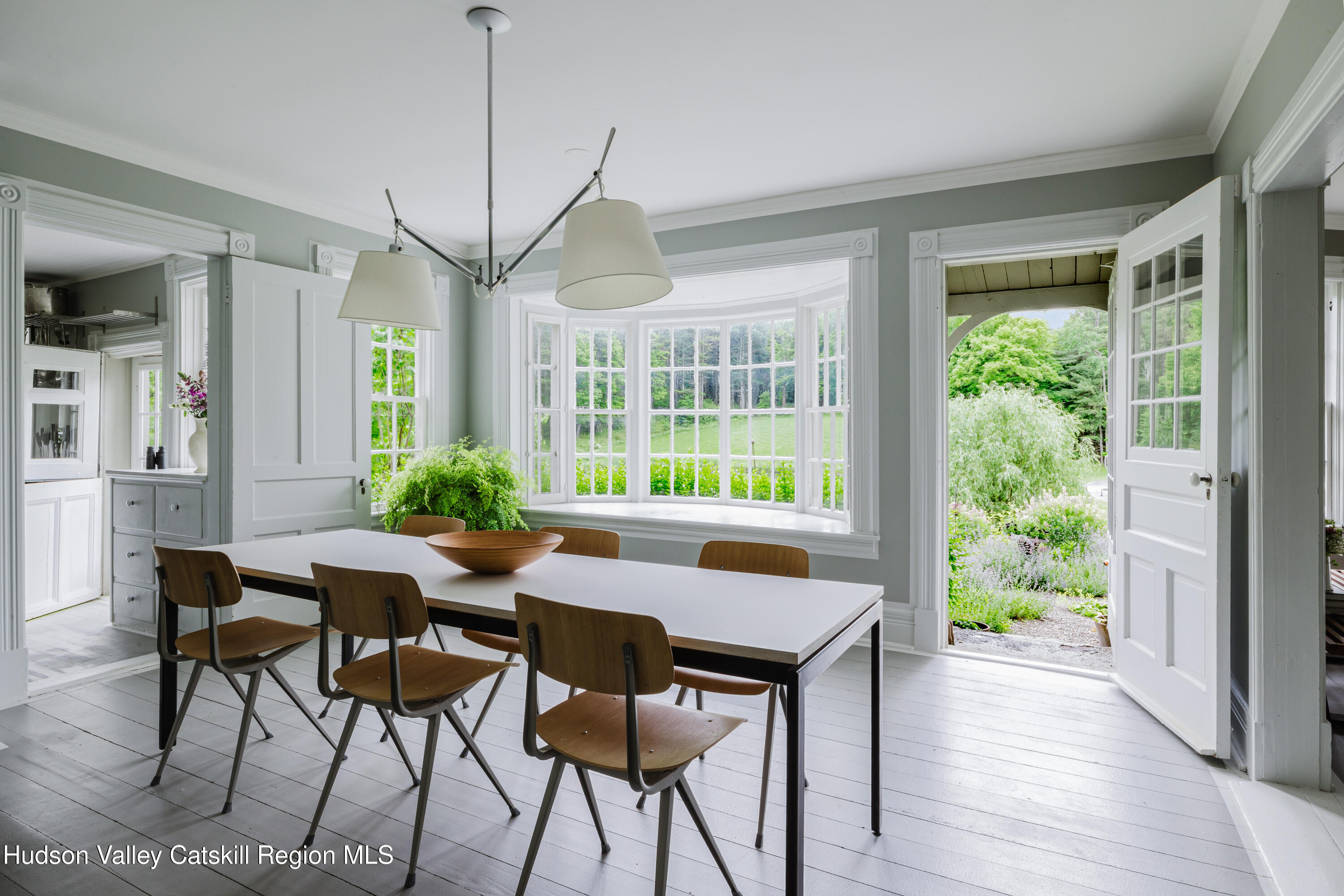 88 Mac Brown Road Hillsdale, NY 12529 - Photo 18 of 69 a view of a dining room with furniture window and wooden floor