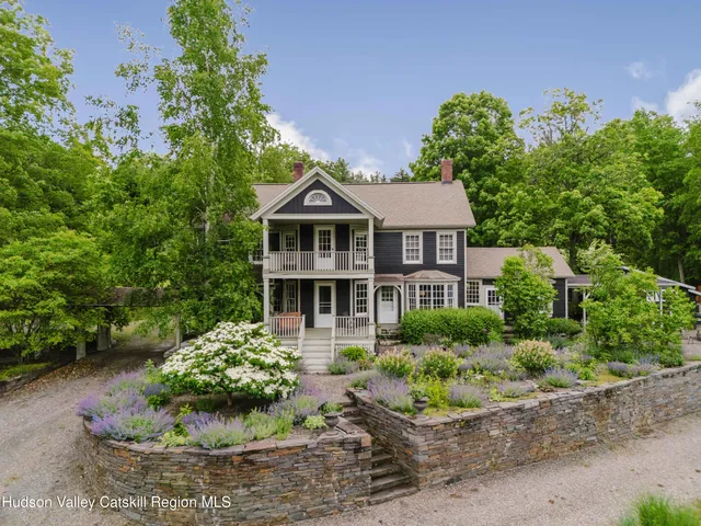 a view of a lake with a yard