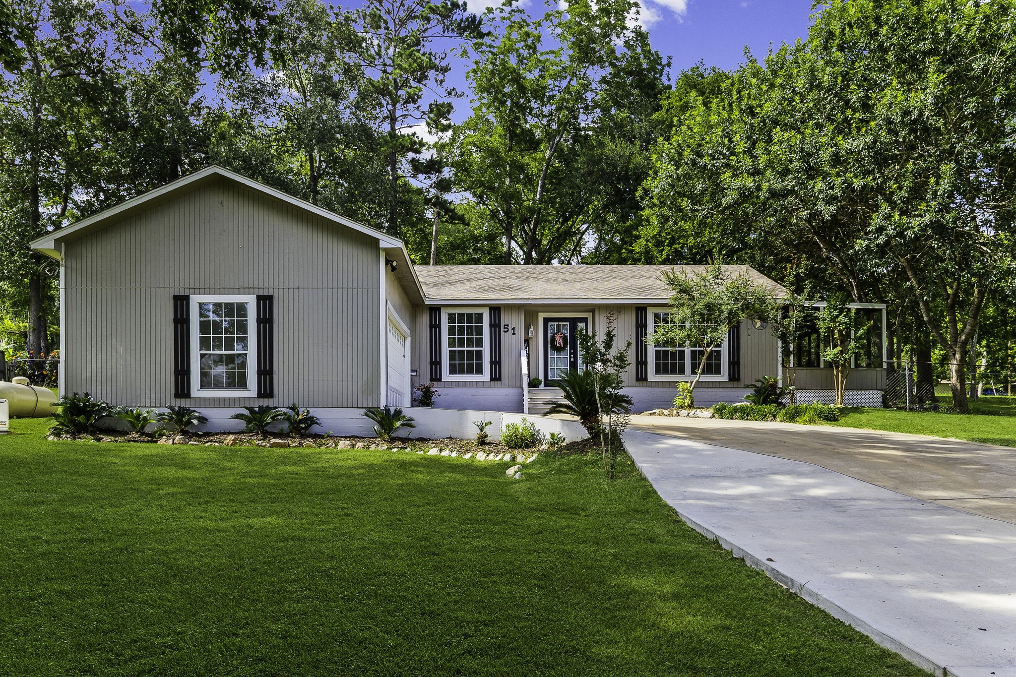 51 Rustling Oaks Coldspring, TX 77331 - Photo 4 of 43 Home itself sits on Lot 15 (one of 3 full lots that come with this property, plenty of room to expand or build next door, or behind the house)