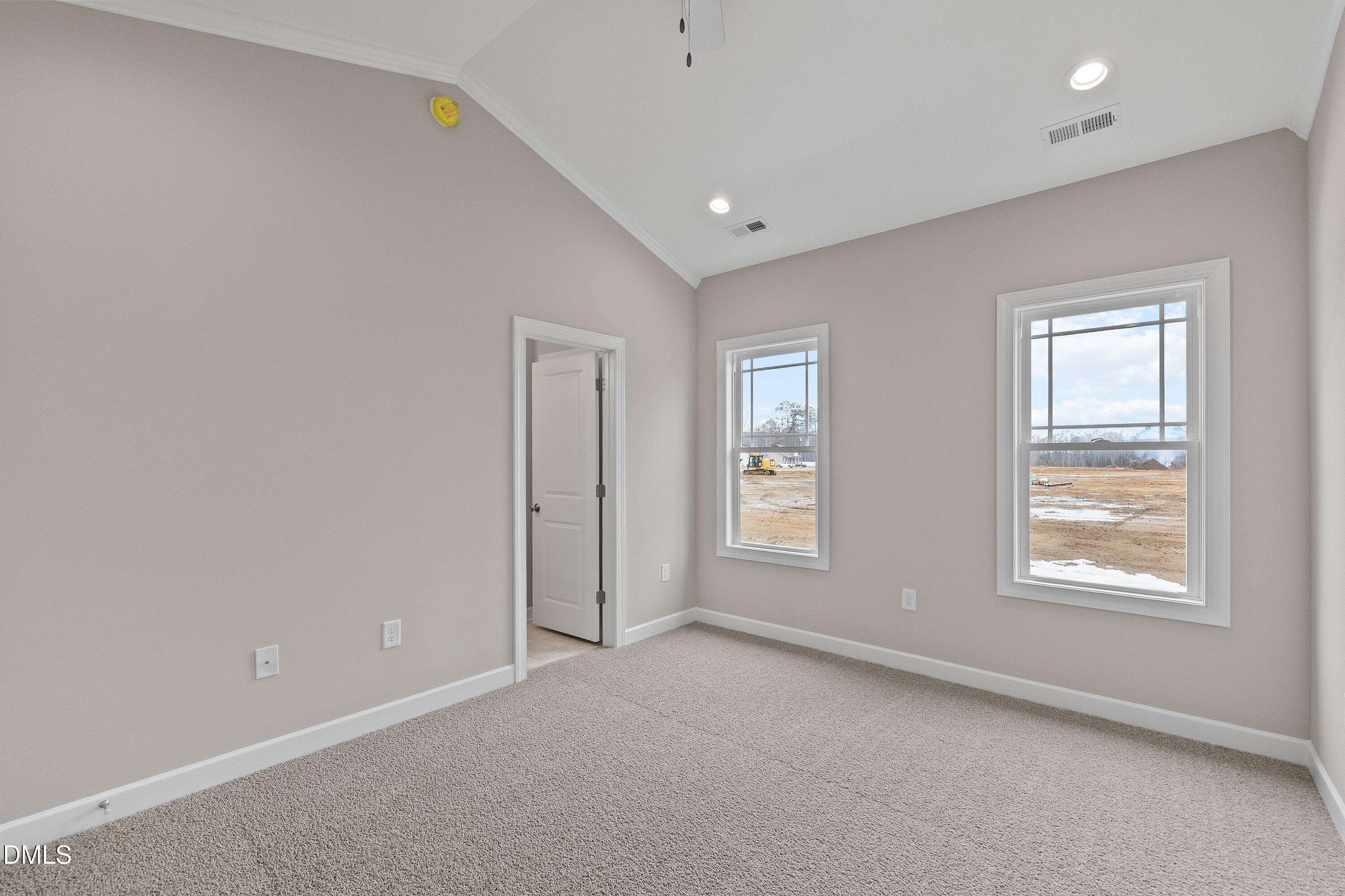 926 Micro Road West Selma, NC 27576 - Photo 32 of 41 an empty room with windows