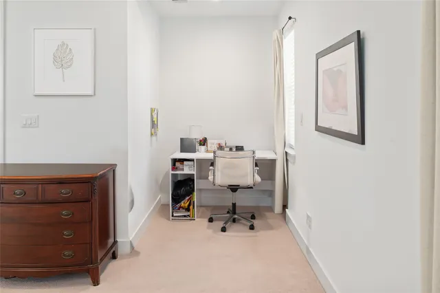 a bedroom with bed and a window