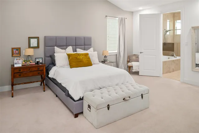 a room that has a dresser and a chair in it