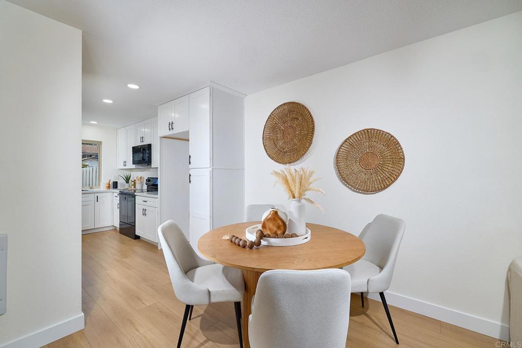 11364 Poblado Road San Diego, CA 92127 - Photo 11 of 39 a dining room with furniture and window