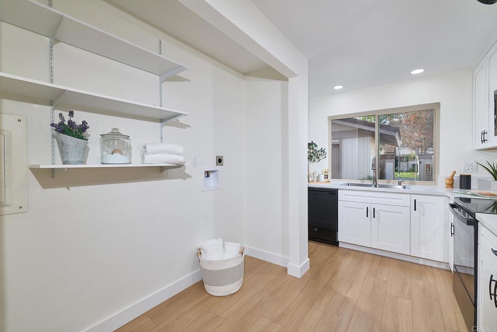 11364 Poblado Road San Diego, CA 92127 - Photo 15 of 39 a bathroom with a sink a toilet and bathtub