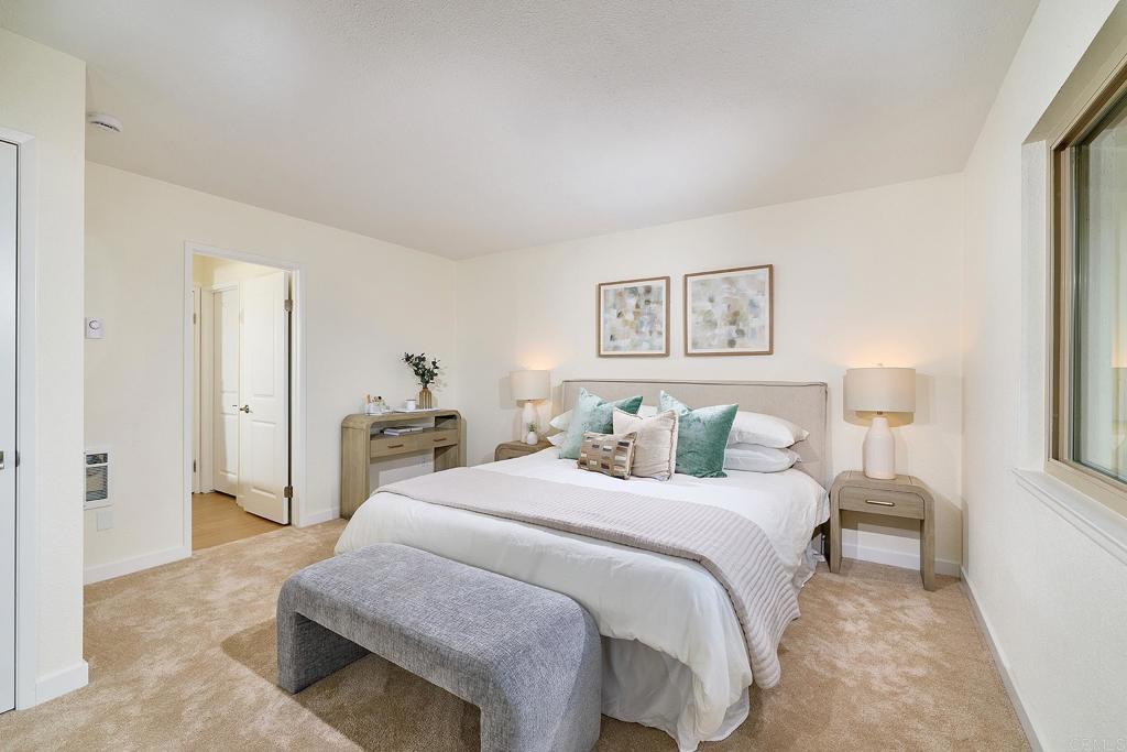 11364 Poblado Road San Diego, CA 92127 - Photo 18 of 39 a bedroom with a bed and a couch