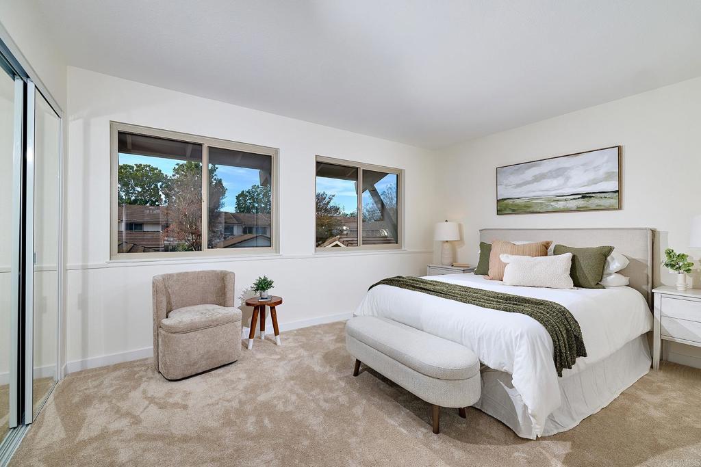 11364 Poblado Road San Diego, CA 92127 - Photo 22 of 39 a bedroom with bed and a couch