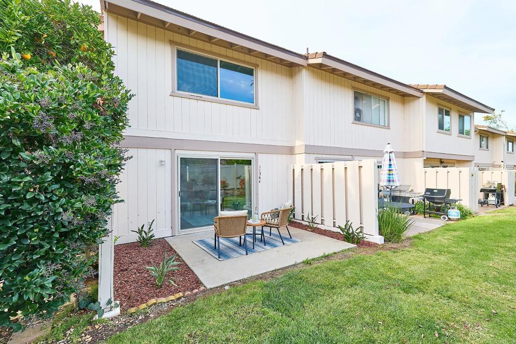 11364 Poblado Road San Diego, CA 92127 - Photo 26 of 39 a view of a house with backyard and sitting area