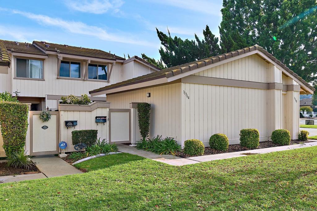 11364 Poblado Road San Diego, CA 92127 - Photo 3 of 39 a view of a house with backyard and plants