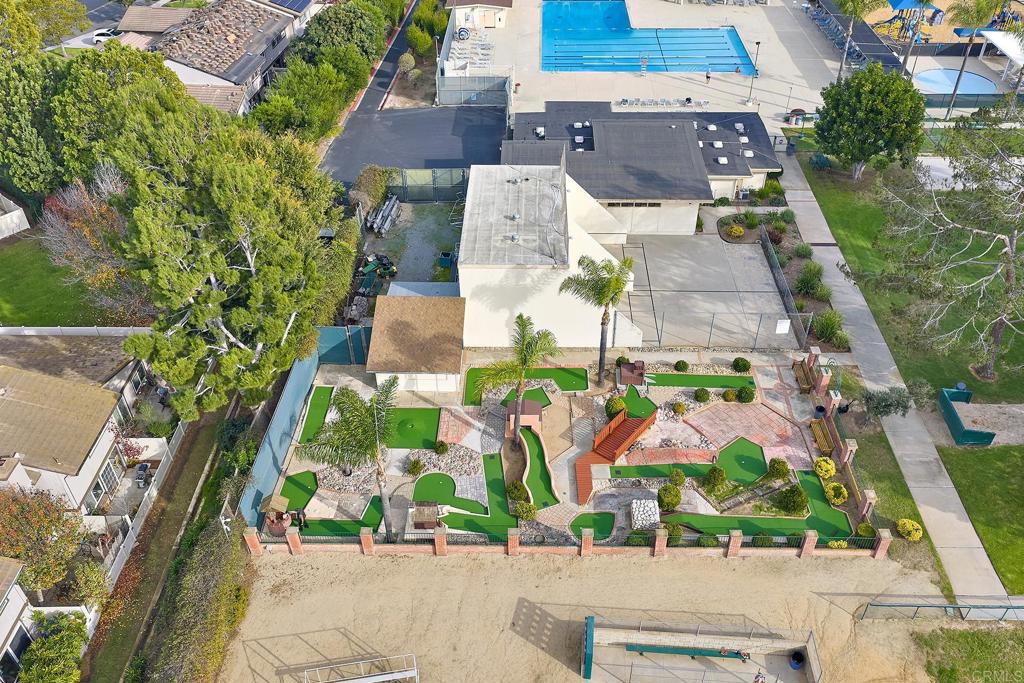 11364 Poblado Road San Diego, CA 92127 - Photo 32 of 39 an aerial view of multiple houses with yard