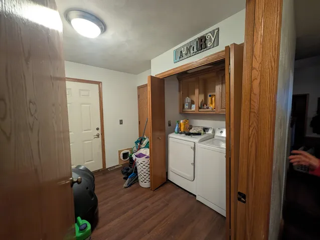 a view of a room with a large window