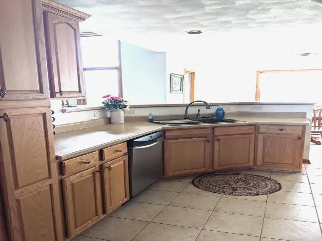 a view of a livingroom with furniture and window