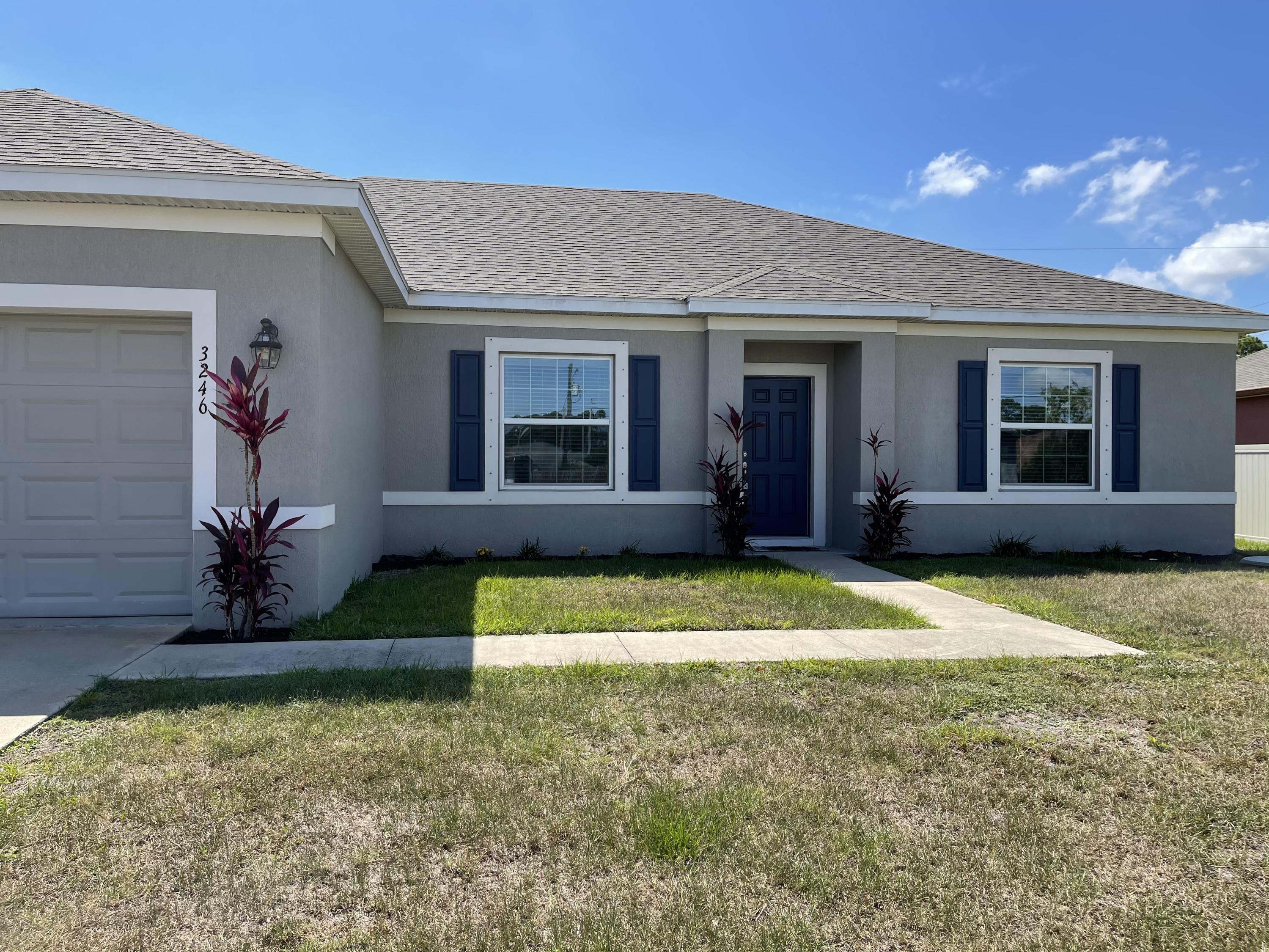 3246 Southwest Constellation Road Port St. Lucie, FL 34953 - Photo 2 of 22 front