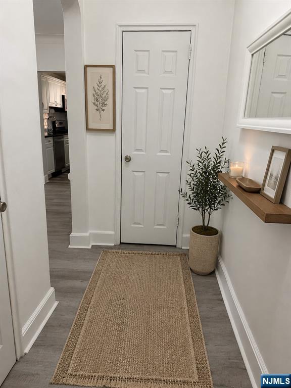 100 Prospect Avenue, Unit 2E Hackensack, NJ 07601 - Photo 4 of 16 a view of a room that has a bench in it
