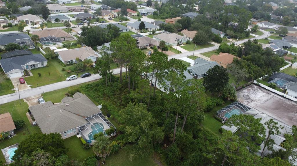 37 Sederholm Path Palm Coast, FL 32164 - Photo 13 of 13 an aerial view of residential houses with outdoor space and trees