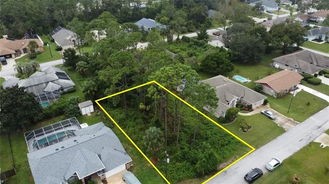 an aerial view of house with a swimming pool