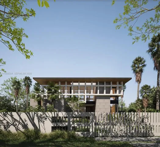 an aerial view of a house with outdoor space and a lake view