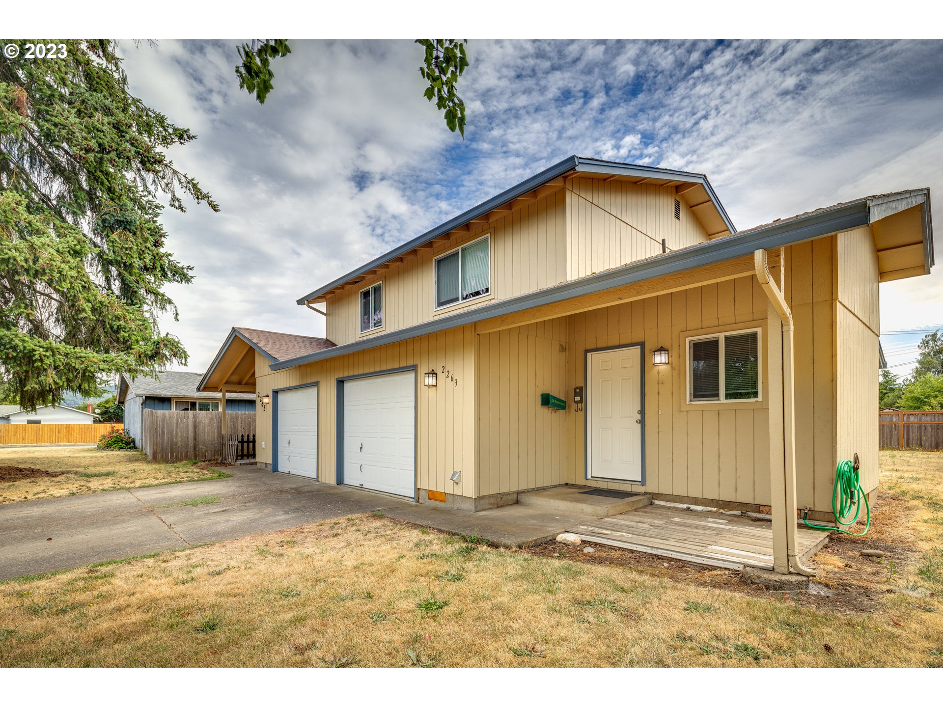 2263 2nd Street Springfield, OR 97477 - Photo 3 of 23 a view of a house with a outdoor space