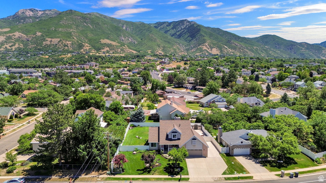 4792 Glasmann Way South Ogden, UT 84403 - Photo 9 of 70 Expansive residential neighborhood featuring lush tree canopy and distant mountain ranges