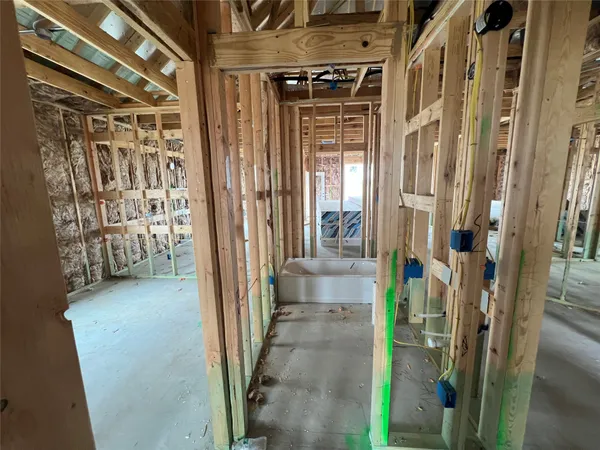 a view of a wooden door with a glass door