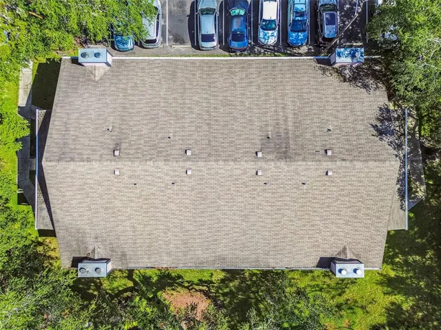 a brick building with a yard