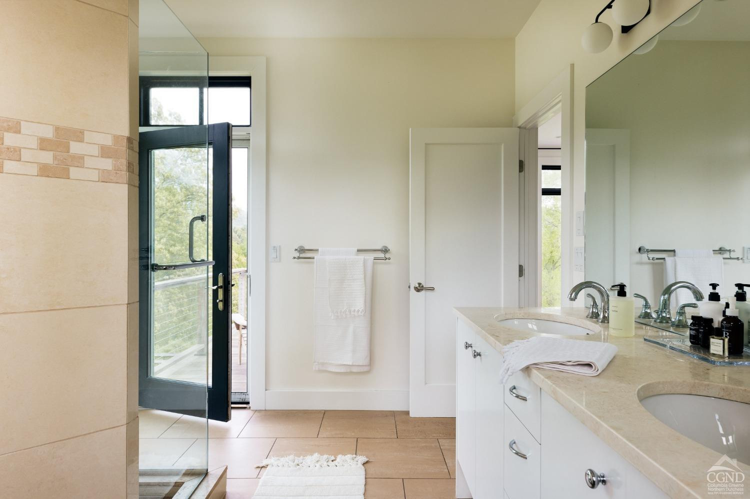 128 Robin Lane Copake, NY 12516 - Photo 15 of 33 a bathroom with a sink and a mirror