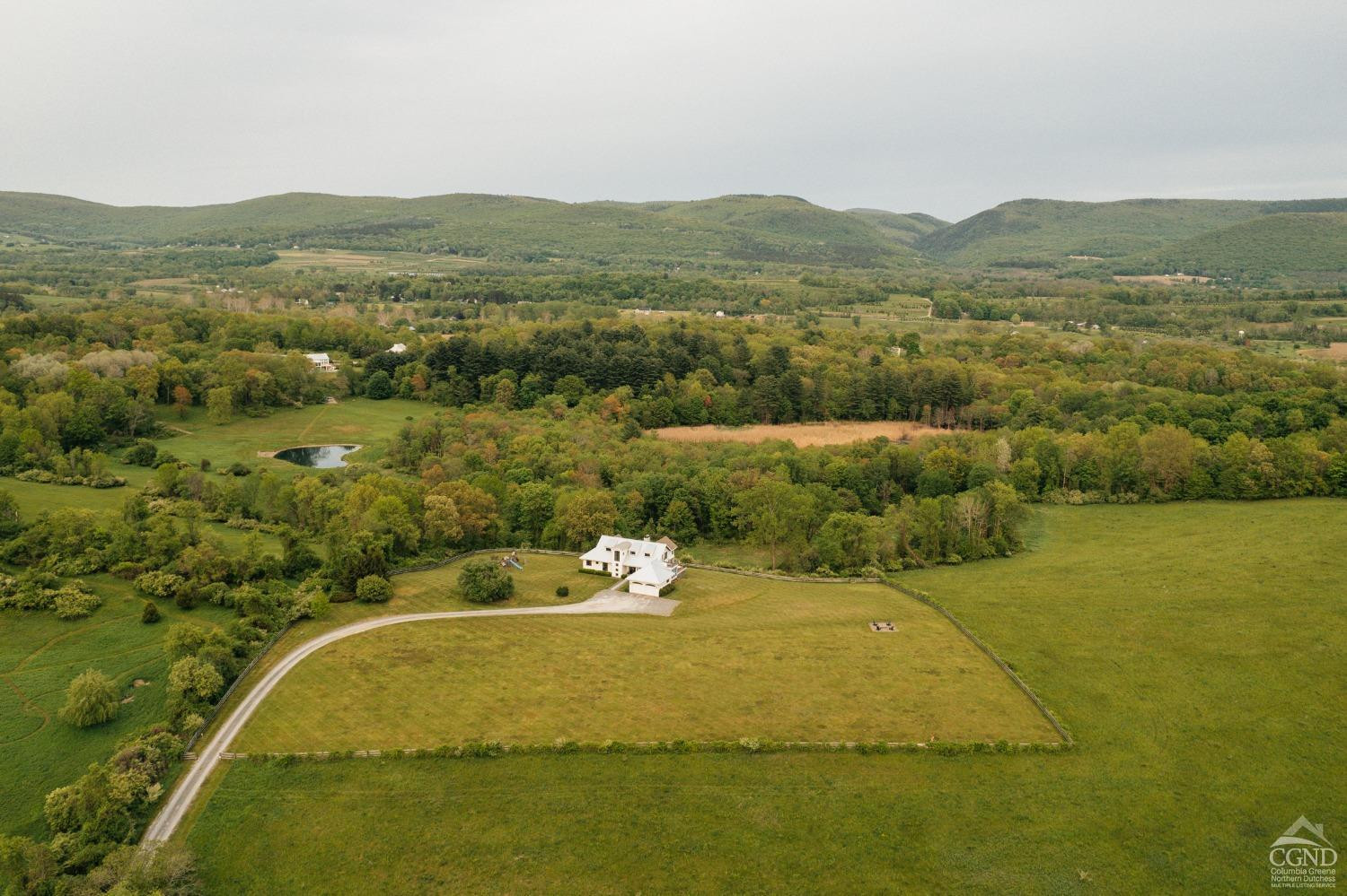 128 Robin Lane Copake, NY 12516 - Photo 33 of 33 a view of a lake with a mountain