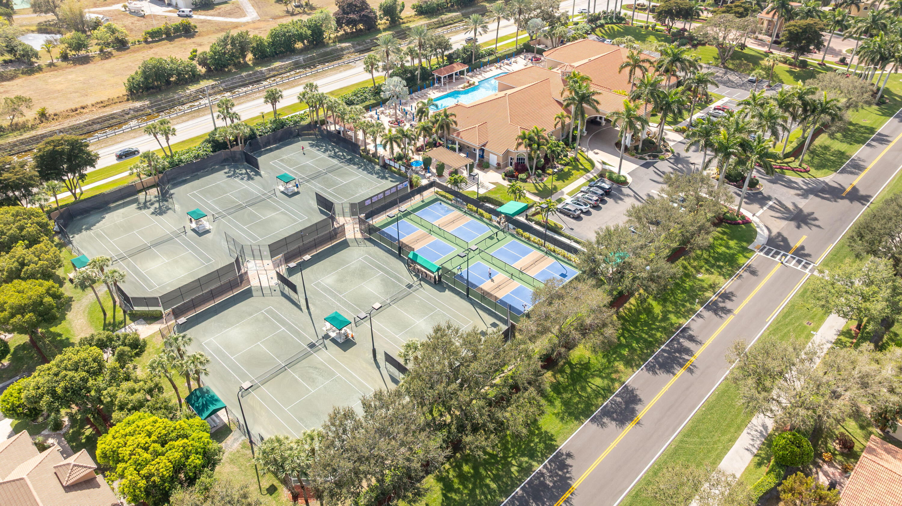 6698 Vía Roma Delray Beach, FL 33446 - Photo 43 of 50 an aerial view of residential houses with outdoor space