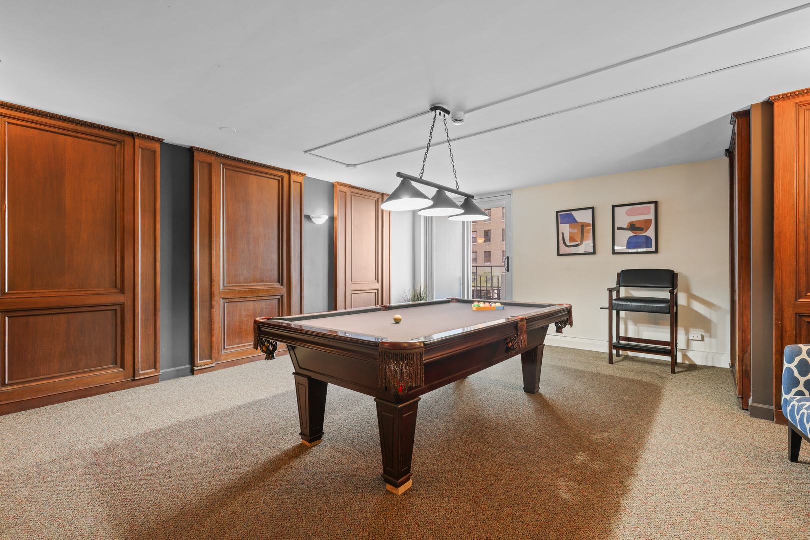 6033 North Sheridan Road, Unit 24B Chicago, IL 60660 - Photo 33 of 36 a room with pool table and a window