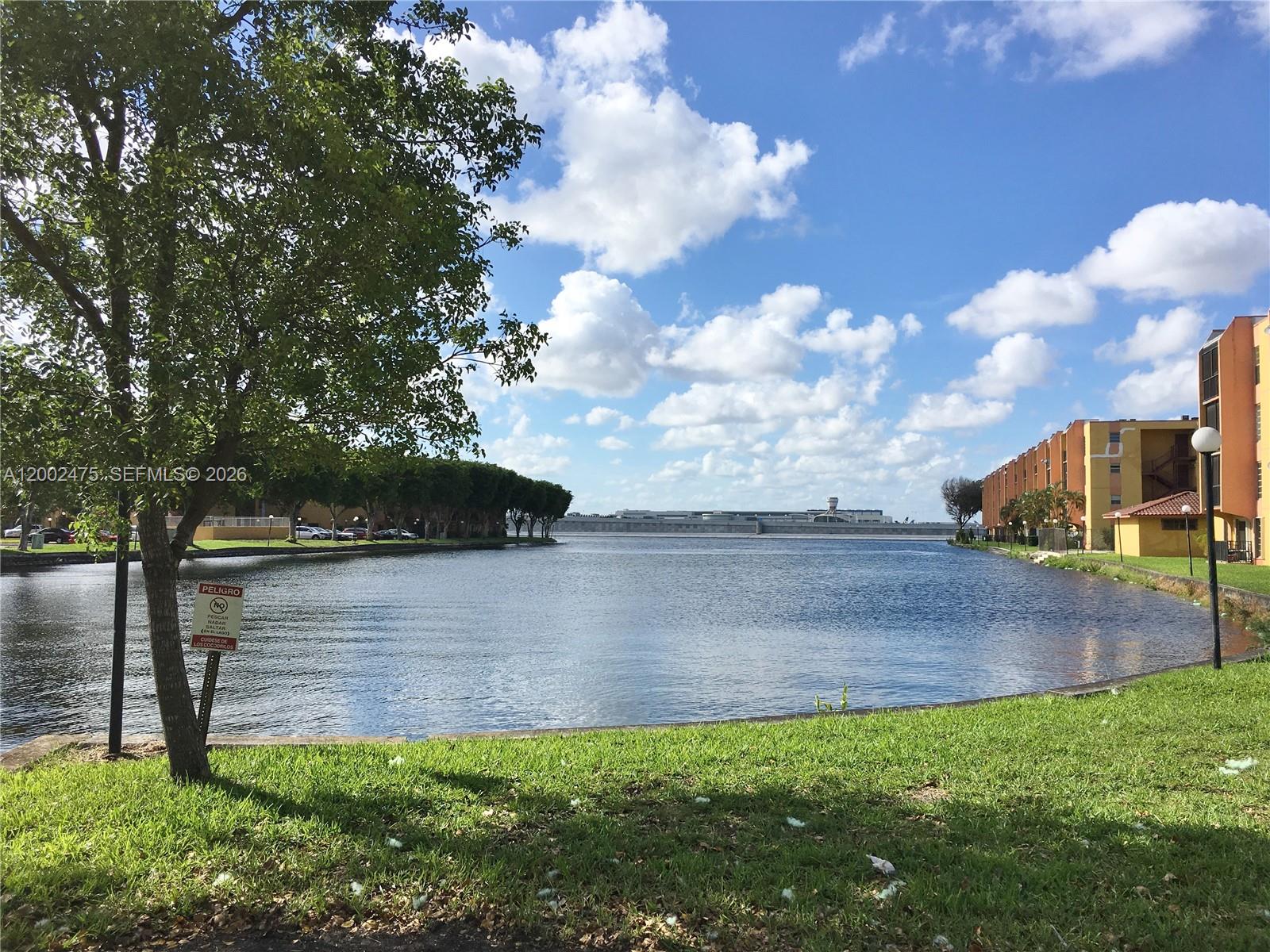 4709 Northwest 7th Street, Unit 1079 Miami, FL 33126 - Photo 23 of 28 a view of a backyard