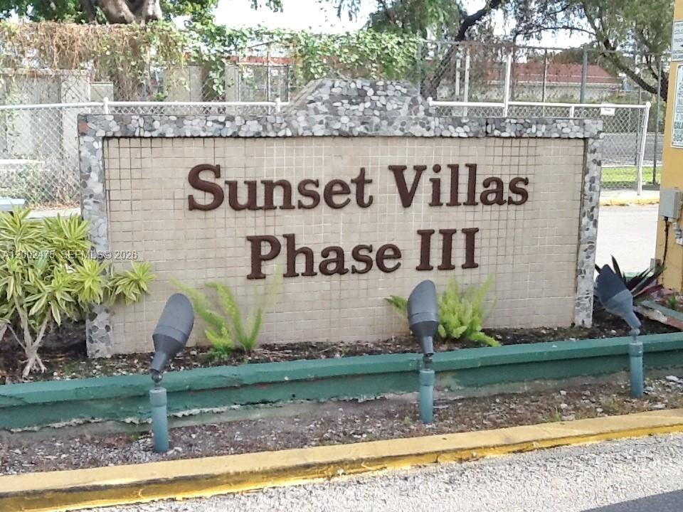 4709 Northwest 7th Street, Unit 1079 Miami, FL 33126 - Photo 27 of 28 a sign on the side of a building