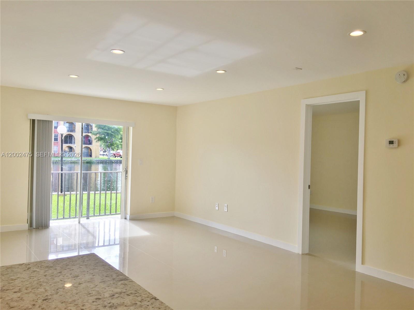4709 Northwest 7th Street, Unit 1079 Miami, FL 33126 - Photo 7 of 28 a view of livingroom with furniture