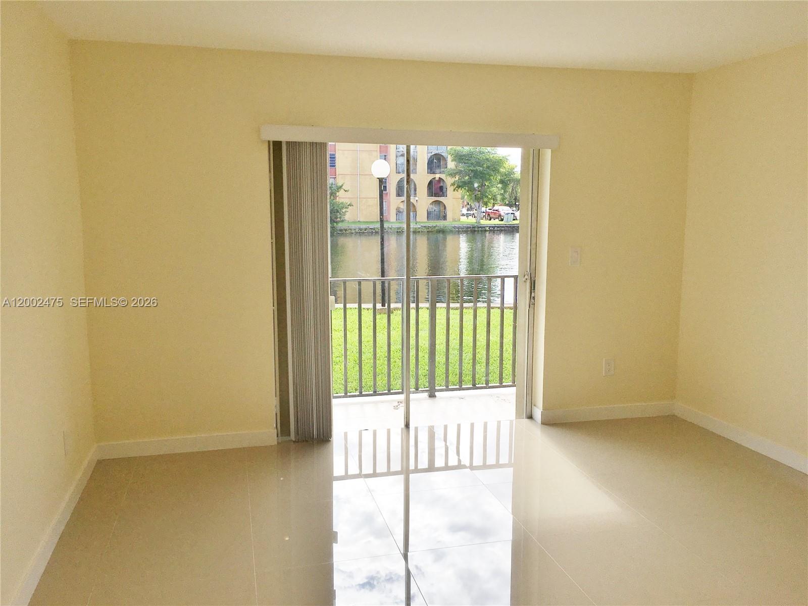 4709 Northwest 7th Street, Unit 1079 Miami, FL 33126 - Photo 8 of 28 a picture of a door