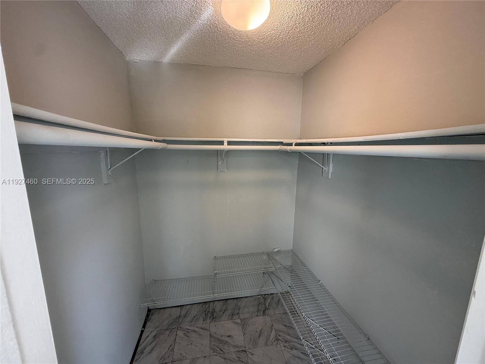 1900 West 68th Street, Unit G308 Hialeah, FL 33014 - Photo 10 of 10 wooden floor in an empty room