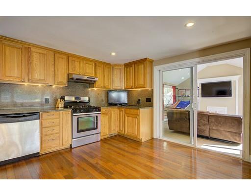 5 Olive Road Billerica, MA 01821 - Photo 12 of 27 a kitchen with a sink cabinets and wooden floor