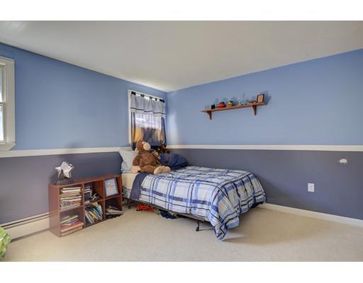 5 Olive Road Billerica, MA 01821 - Photo 24 of 27 a bedroom with a bed a desk and chair