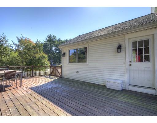5 Olive Road Billerica, MA 01821 - Photo 4 of 27 a view of a deck with wooden floor and bench with wooden floor