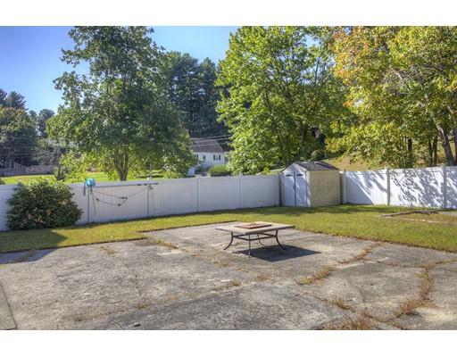 5 Olive Road Billerica, MA 01821 - Photo 6 of 27 a backyard of a house with a yard and tree