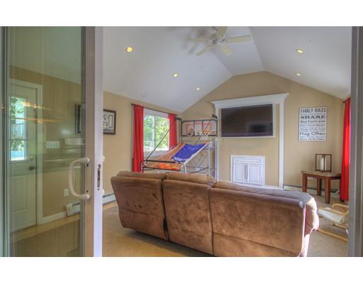 5 Olive Road Billerica, MA 01821 - Photo 9 of 27 a living room with furniture and a flat screen tv