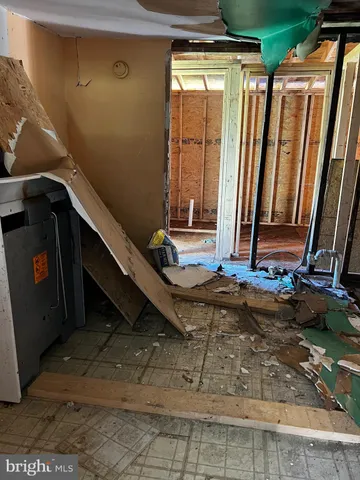 a view of a room with wooden walls