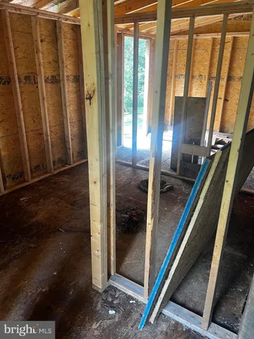 a kitchen with a stove and a window