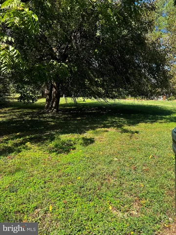 a fire hydrant in the middle of a field