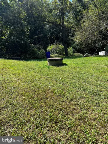 a view of a backyard with a garden