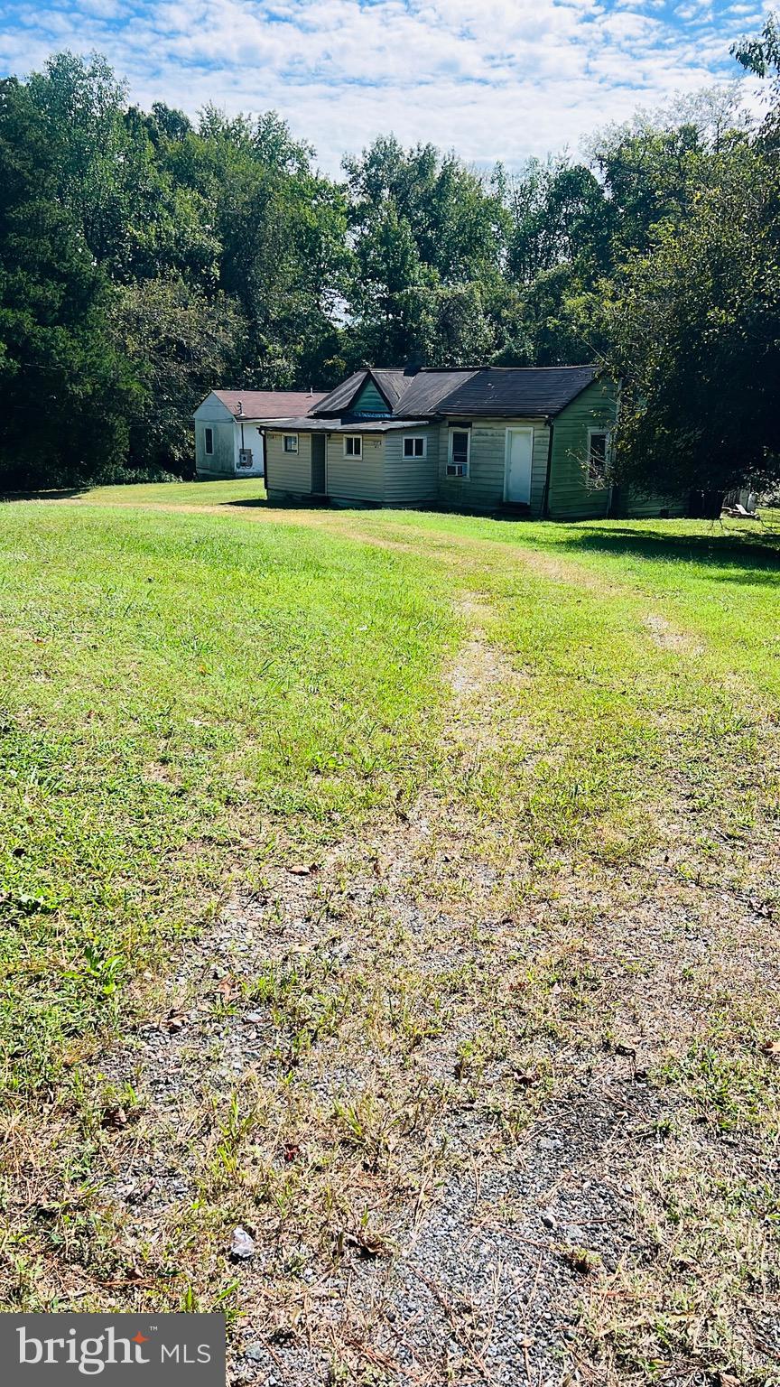 Mt Victoria Road Newburg, MD 20664 - Photo 4 of 43 a view of a swimming pool with an outdoor space and seating area