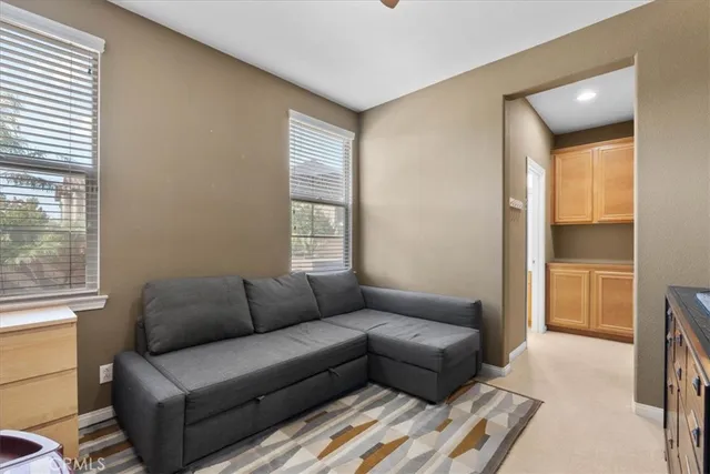 a living room with furniture and a table